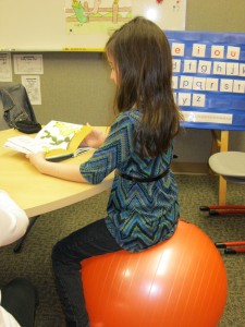 First grader using a ball chair